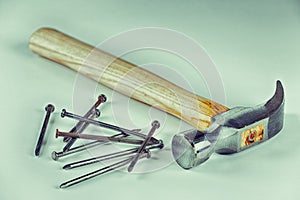 Hammer with its nails