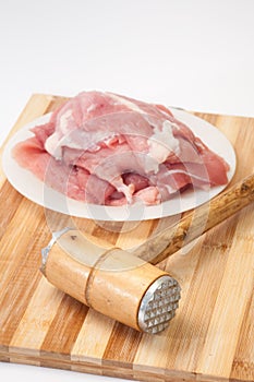 Hammer for meat and raw meat prepared for frying