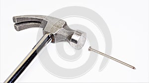A hammer is a metal locksmith percussion instrument