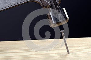 Hammer and nail closeup