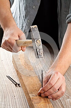 Hammer and nail woodworking