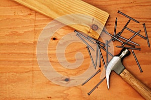 Hammer And Nails On Plywood
