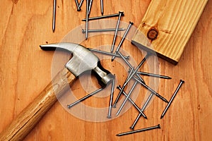 Hammer And Nails On Plywood photo