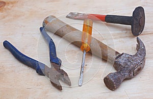 hammer, pliers, screwdrivers and chisels