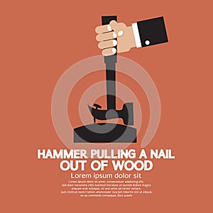 Hammer Pulling a Nail Out of Wood