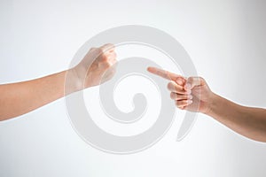 Hammer or rock symbol and nail symbol in playing rock paper scissors game on white background