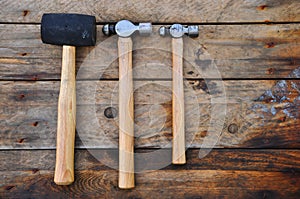 Hammer set of hand tools or basic tools on wooden background