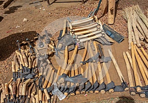 Hammer, sickle, hoe and other tools for field work in a market in Sudan