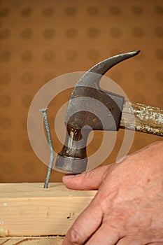 Hammer Smashing Man's Thumb photo
