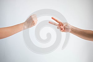 Hammer symbol and scissors symbol in playing rock paper scissors game on white background