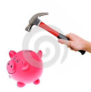 Hammer about to smash piggy bank