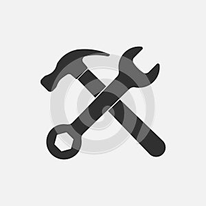 Hammer and wrench icon. photo