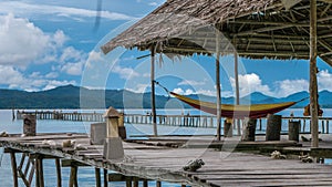 Hammock on Diving Station - Kri Island. Gam in Background. Raja Ampat, Indonesia, West Papua