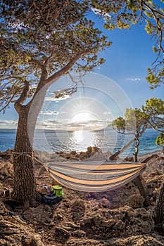 Hammock net installed on Punta Rata beach in Brela, Croatia, Dalmatia, Croatian azure coast photo