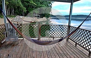 Hammock over a cabin on a lake, Flores Peten, Guatemala