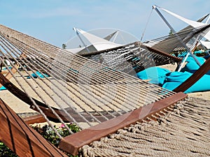 Hammock and sunbeds details in the sunlight