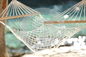 Hammock on a tropical beach resort vacation concept