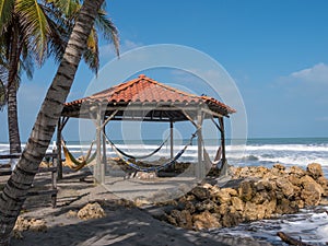 Hammocks at beach hut photo