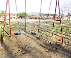 Hammocks or empty swings in the park photo