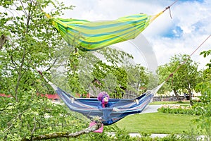 Hammocks between trees photo