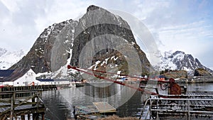 Hamnoy harbour quay at Reinefjorden on the Lofoten in Norway in winter