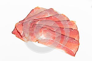 Hamon sliced on white background. Spanisch traditional meat