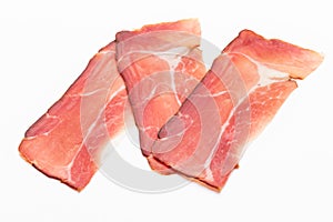 Hamon sliced on white background. Spanisch traditional meat