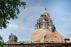 Hampi temple gopura with Hanuman carved idol, temple gopura constructed on granite rock, Hampi, Karnataka, India,