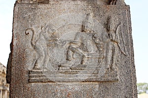 Hampi Vittala Temple Stone Pillar Carving of Raama human, Lakshman human and Hanuman the monkey god giving the ring of Sita