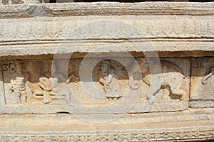 Hampi Vittala Temple Wall Carving of king krishnadevaraya and his courtier talking to an elephant trader
