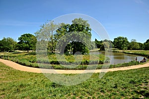 Hampstead Heath is a large, ancient London heath embracing ponds woodlands lido playgrounds and training track