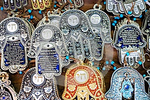 Hamsa with `Chai` symbol - `Living` sale at Carmel Market,