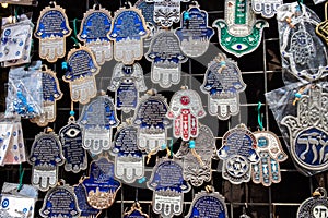 Hamsa with Chai symbol - Living sale at Carmel Market, popular marketplace in Tel-Aviv