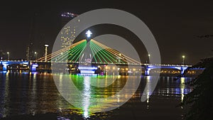 Han river bridge in Danang is opening in the evening ligtining