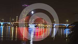 Han river bridge in Danang is opening in the evening ligtining