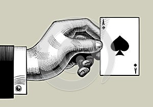 Hand with the ace of Spades playing card. Vintage engraving stylized drawing.