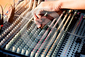 Hand adjusting audio mixer control music,music equipment for sound mixer control, electronic device.
