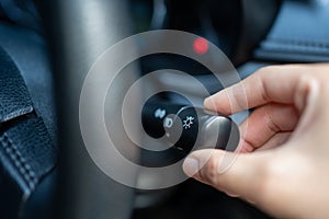 Hand adjusting car headlight control switch