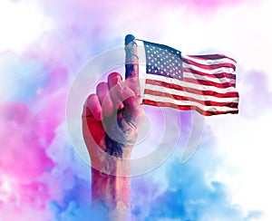 Hand with American flag tied on its index finger