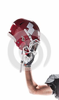 The hand of american football player with helmet on white background