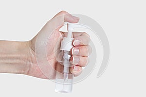 Hand antibacterial sanitizer dispenser pump, alcohol gel to wash hands, liquid soap to clean hands free from viruses and diseases.