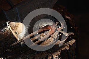 Hand anvil. Tools in old blacksmith shop