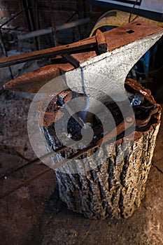 Hand anvil. Tools in old blacksmith shop