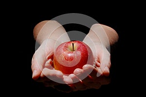 Hand with apple