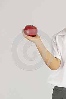 hand with apple on white background