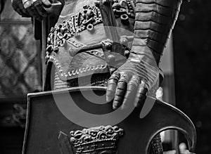Hand in armour of the medieval knight statue