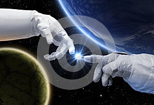 Hand of astronaut and robot. Contact with other civilizations photo
