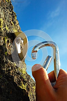 Hand attaching carabiner