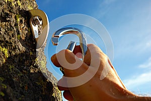 Hand attaching carabiner