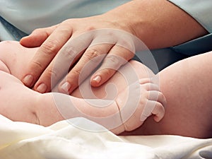 Hand on the baby's stomach